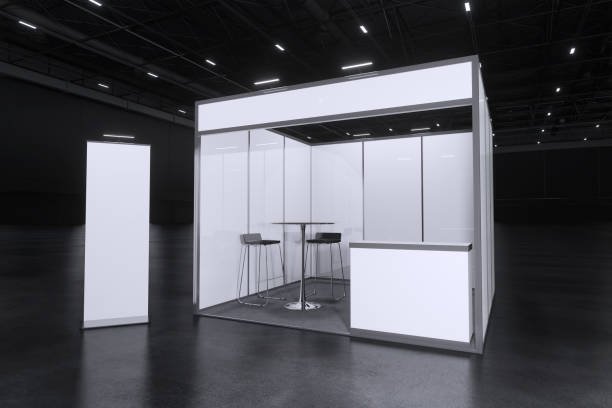 Exhibition booth under construction with build crew on site